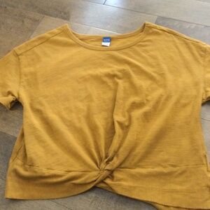Girls cropped twist front shirt (appears more orange than in the photo)